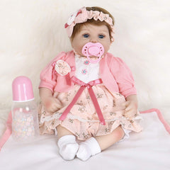ENADOLL Reborn Baby Doll front view with pink hairband for nurturing play