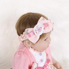 Soft blanket with ENADOLL Reborn Baby Doll adds comforting snuggle moments