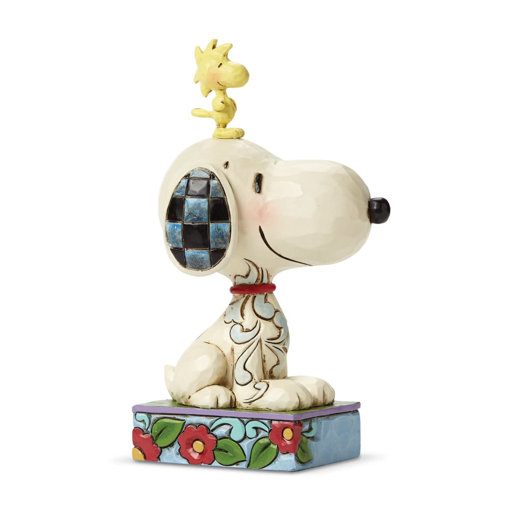 Enesco Jim Shore Snoopy and Woodstock best-friend figurine; vivid folk-art display piece