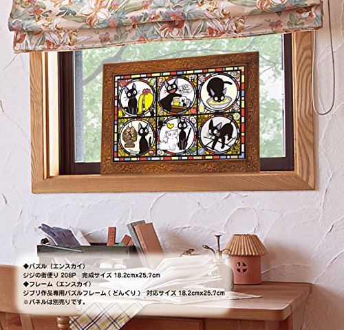 Ensky stained glass style puzzle featuring Jiji, ideal for bright window decor and cozy puzzle sessions.