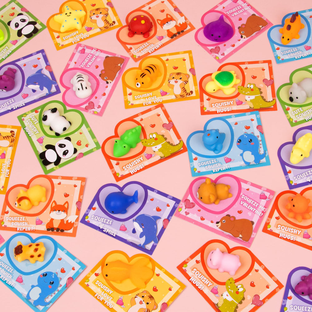 Classroom Valentines activity setup featuring cards, toys, and bags