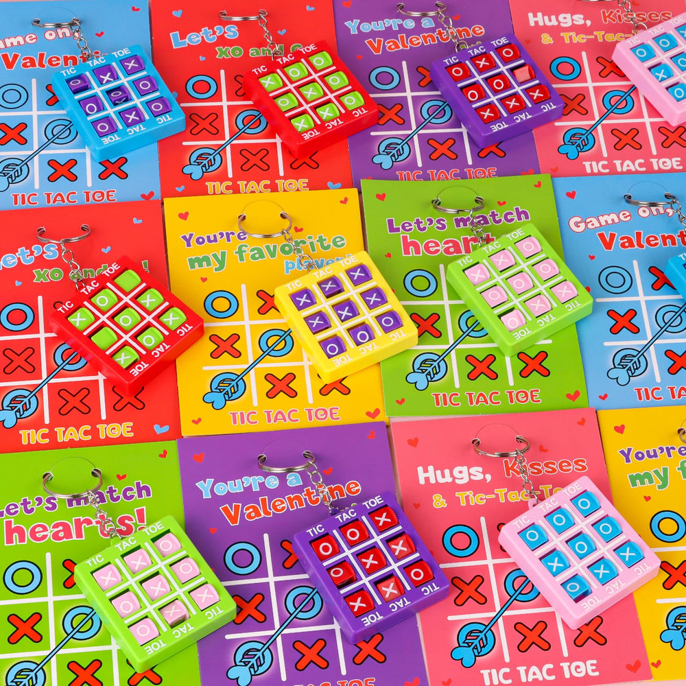 Envotek tic-tac-toe keychains close-up, durable plastic for safe play.