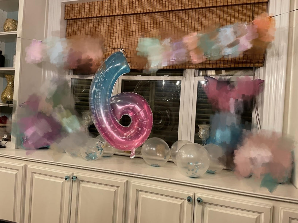 Enyeopd 40-inch number balloon 29 in blue and pink, creates dramatic party focal point.