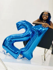 Enyeopd birthday decor setup showcasing a large 11 balloon.