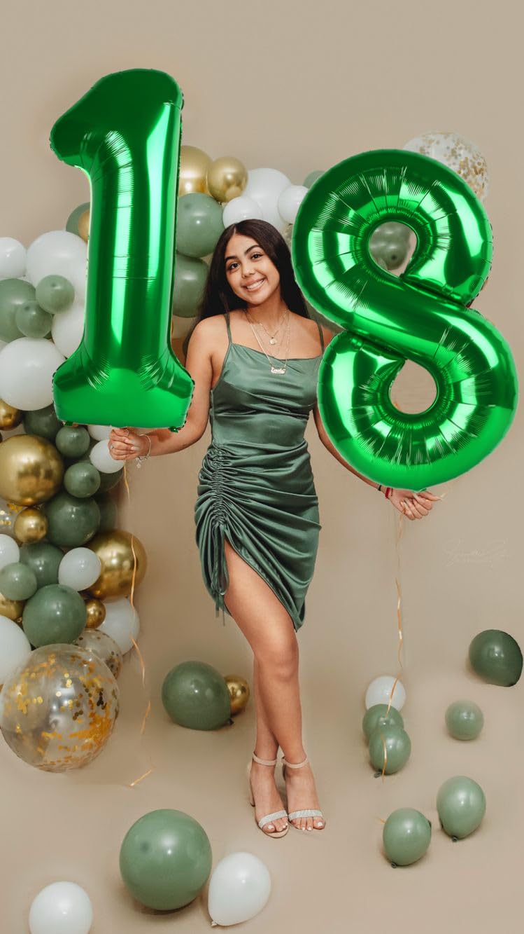 Enyeopd number balloons wedding decor setup dramatic backdrop.