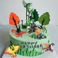 EOIVSH mini dragon figure used as a cake topper for festive celebrations.