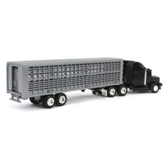 ERTL cattle figures inside trailer for realistic storytelling.