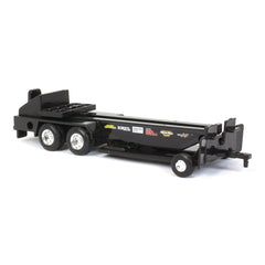 ERTL pulling sled side view highlighting plastic construction and toy feel