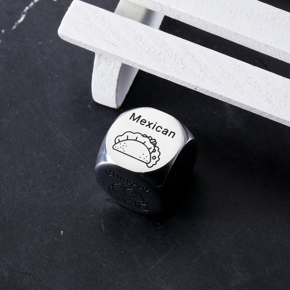Close-up of rolling Eulalia Eclogue dice during date night