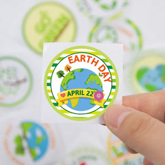 Fancy Land classroom-label stickers highlight eco-messages for organized desks.