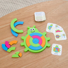 Fat Brain Toys Bugzzle pieces tray setup helps kids arrange pieces on the bug tray