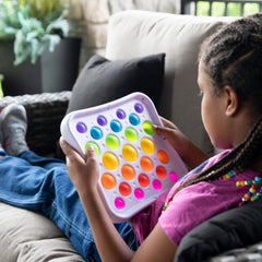 Fat Brain Toys Dimpl Pops Deluxe easy-clean surface supports quick wipe-down after sessions.