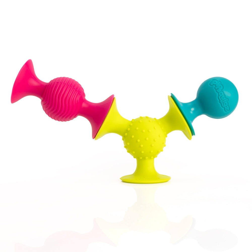 pipSquigz attached to a stroller for on-the-go play