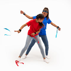 Fat Brain Toys Ribbon Ninja Game headbands securing ribbons during action