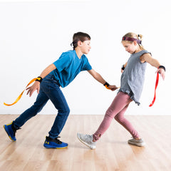 Kids ready to play Fat Brain Toys Ribbon Ninja Game