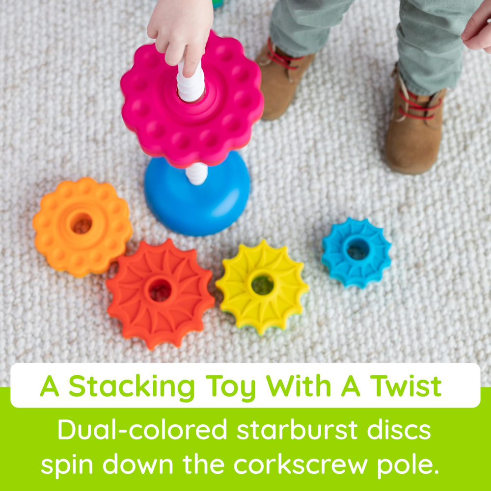 Fat Brain Toys SpinAgain stack-and-spin helping toddlers practice coordination and sequencing.