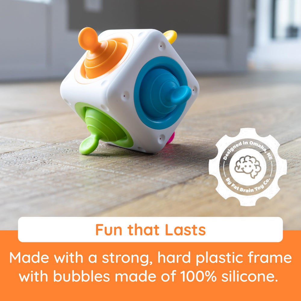 Fat Brain Toys Tugl Cube handheld size demonstrates easy grip for all ages