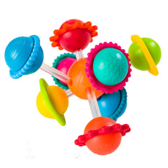Fat Brain Toys Wimzle with spinning center balls for tactile exploration.