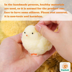 FauKait handmade chick squish toy side view showing pliable material for calming compression.