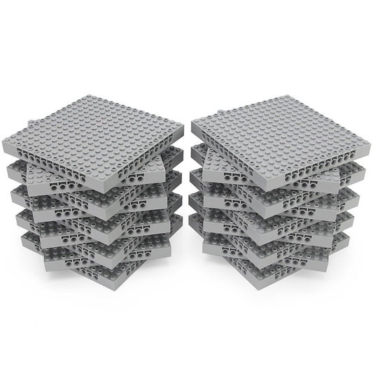Feleph base brick 16x16 light bluish gray plate with holes and pins for versatile builds.