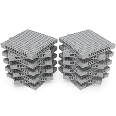 Feleph base brick 16x16 light bluish gray plate with holes and pins for versatile builds.