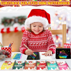 FEREDO KIDS scratch art notebook opened pages — reveals bright rainbow lines for creative play.