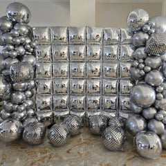 FEYG closeup of metallic-silver square-foil balloons highlights glossy finish