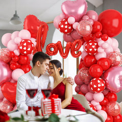 FEYG love letter foil balloons spell a playful message centerpiece.
