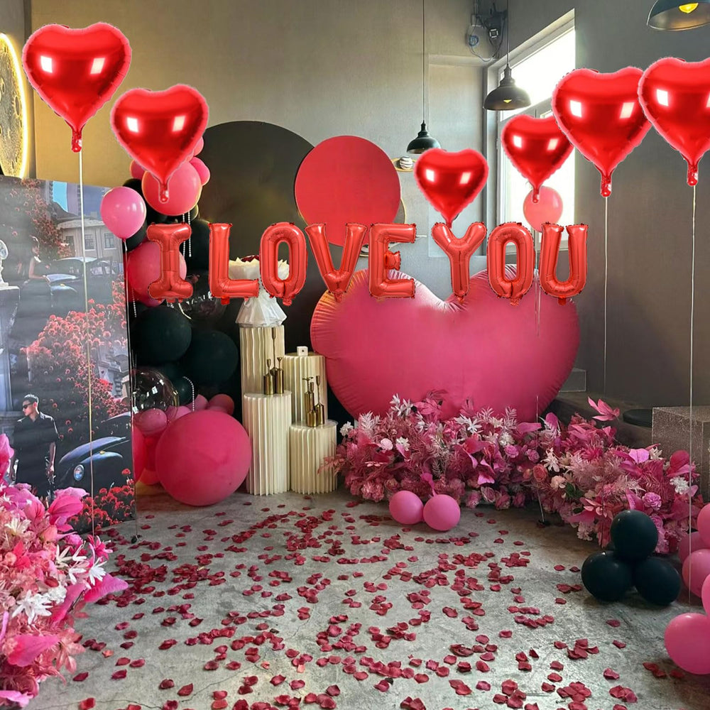 Fezava party centerpiece setup with letters, hearts and petals.