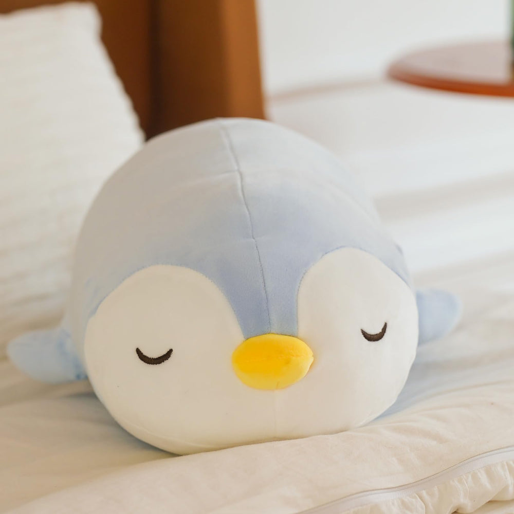 FFxiong penguin plush pillow styled as a bright room decor accent