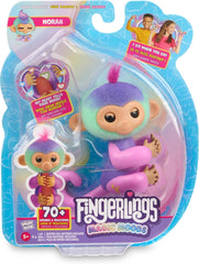 Fingerlings Norah on finger with glowing heart, mood guessing and storytelling play.