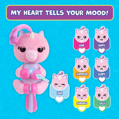 Fingerlings Mimi pink LED heart glows to hint fortune and mood.