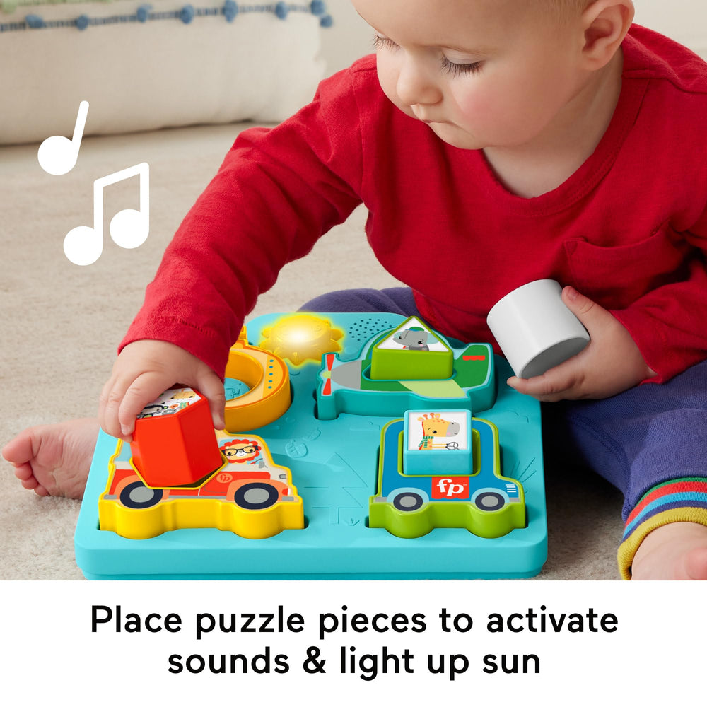 Fisher-Price baby toy base with animal shapes slots for interactive problem solving