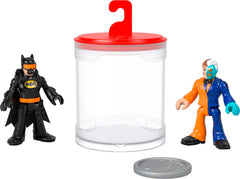 Fisher-Price Imaginext Batman color changer figure dunking in warm water reveals new colors.
