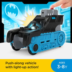 Bat-Tech Tank cockpit action with Batman lights chest during launches.