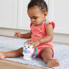 Fisher-Price Laugh & Learn mug rattle beads provide sensory feedback during shakes.