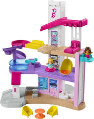 Fisher-Price Little People Barbie DreamHouse elevator in action, encouraging imaginative play and fine motor skills.