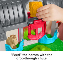 Fisher-Price Little People wagon attachment supports pretend hauling around the barn