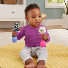 Fisher-Price newborn maracas with colorful beads for visual engagement and gentle rattling
