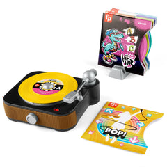Fisher-Price Rockin’ Record Player turntable spins for imaginative pretend play.