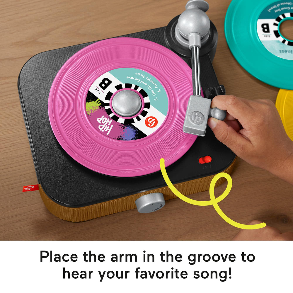 Fisher-Price Rockin’ Record Player volume knob lets kids control sound levels.