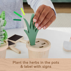 Fisher-Price chalkboard signs for labeling pots in a tiny herb garden