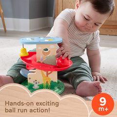 Fisher-Price Wood Treehouse Ball Run teeterboard action promotes cause-and-effect play.