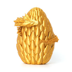 Flavery dragon egg gold exterior enhances shelf decor with mythical charm