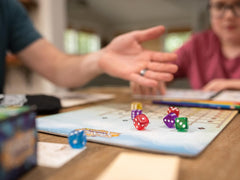 Floodgate Games Sagrada Artisans rulebook opened for quick, accessible learning.