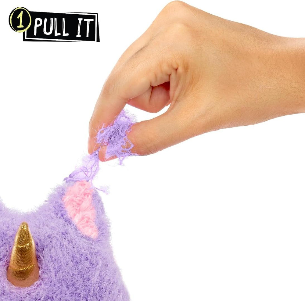Fluffie Stuffiez pull fluff interaction demonstrates interactive play and reveal action.