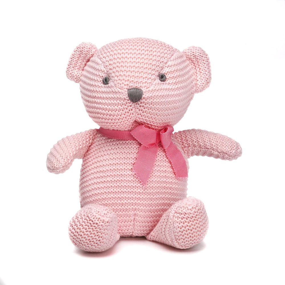 FluffyFun pink teddy bear plush seated for newborn cuddling, soft texture, and comforting grip.