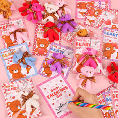 FLYSNK bear keychains attached to backpacks as cute companions.