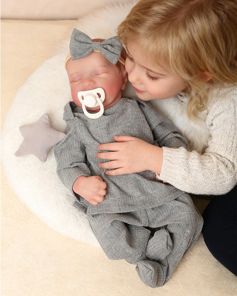 FOCKOF gift-packaging contents include bottle, pacifier, diaper and birth card.