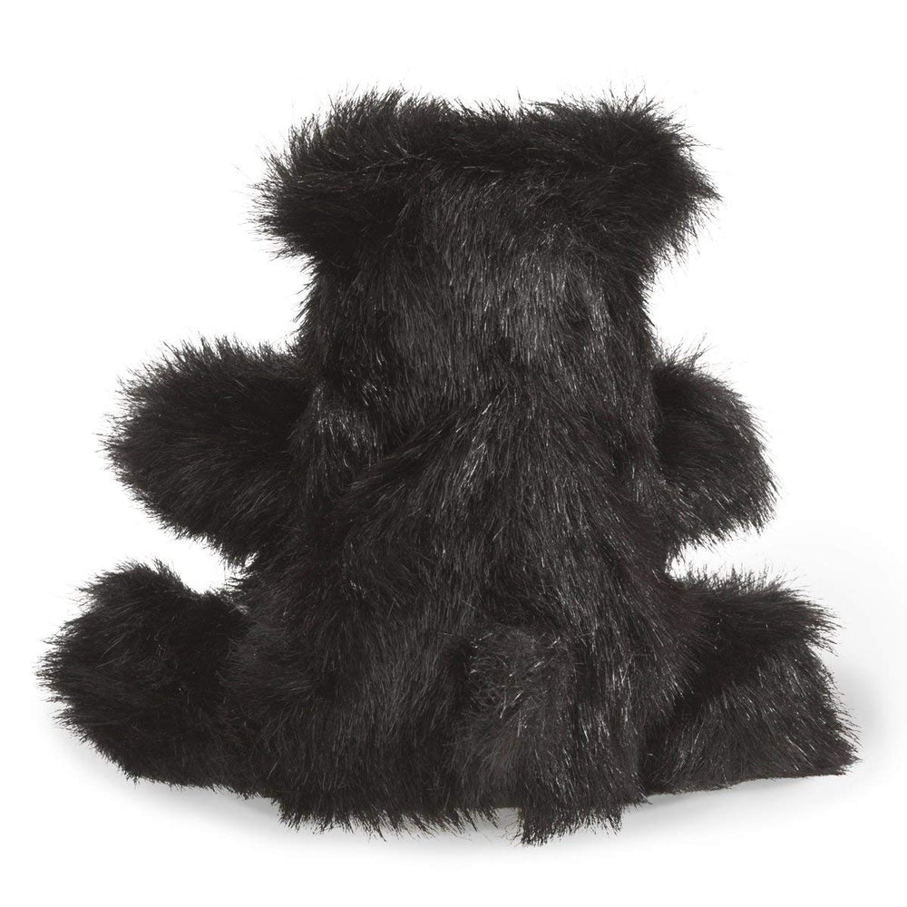 Folkmanis Baby Black Bear puppet in-hand action shows easy manipulation for kids.